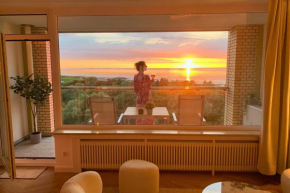 Panoramameerblicksuite direkt am Strand, Garage Wlan, Aufzug, Smarttv,Bettwäsche,Handtücher, Netflix uvm